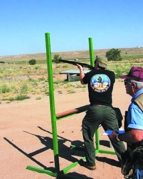 Man shooting his shotgun